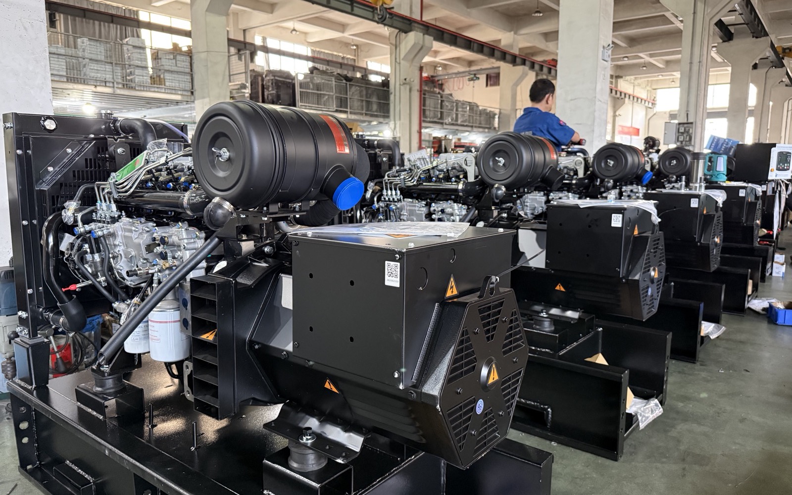 Real industrial diesel generator units assembled in the factory for construction site backup and temporary power inquiries